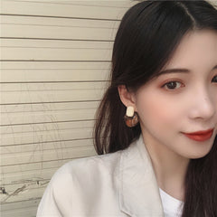 Premium brown resin round earrings